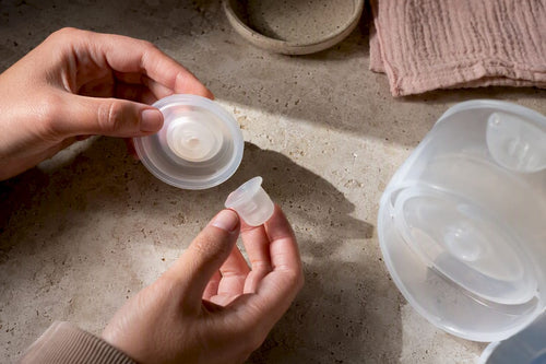 Hands inspecting wearable pump seal components Featured Image